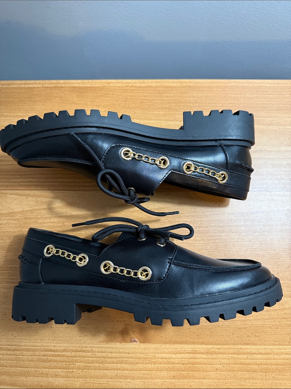 BCBGeneration Black Lug-Sole Loafers with Gold Chain Trim